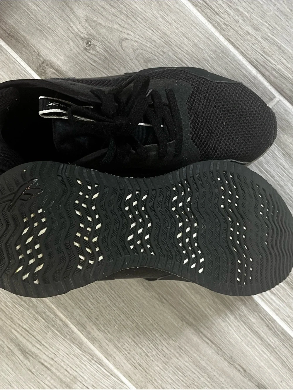Reebok Black Athletic Sneakers with Cream Leopard-Pattern Sole